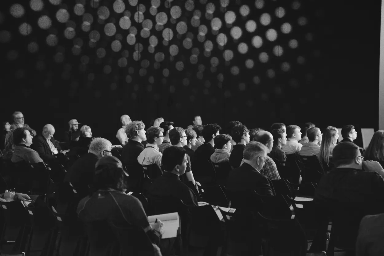 Large medical conference audience attending surgical education and leadership presentation