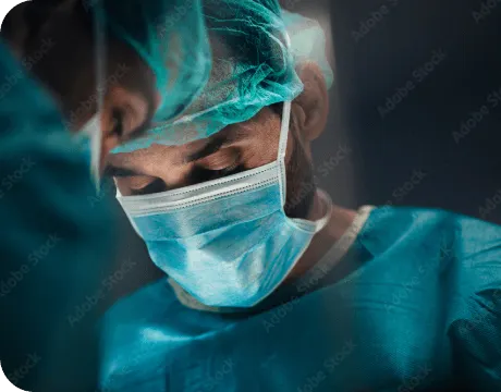 Surgeon performing thoracic surgery related to pleural and pericardial effusions